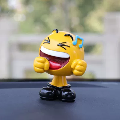 Car ornaments — shaking head doll facial expression - music-120g