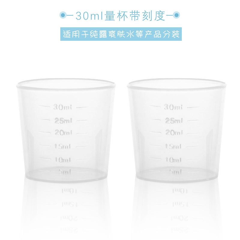 Plastic measuring cup scaled