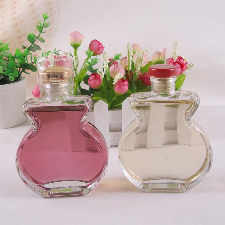 精致高白料二两保健酒玻璃瓶100ml玻璃酒瓶带盖扁药酒瓶现货批发