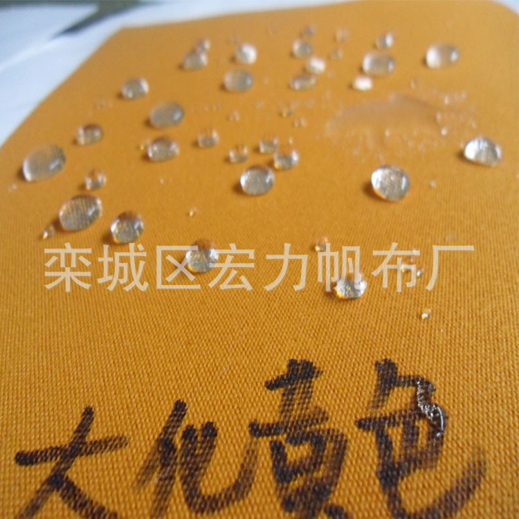 Poliéster amarillo brillante impermeable teñido lienzo naranja mongol bolsa impermeable tela amarilla rollo completo tela al por mayor