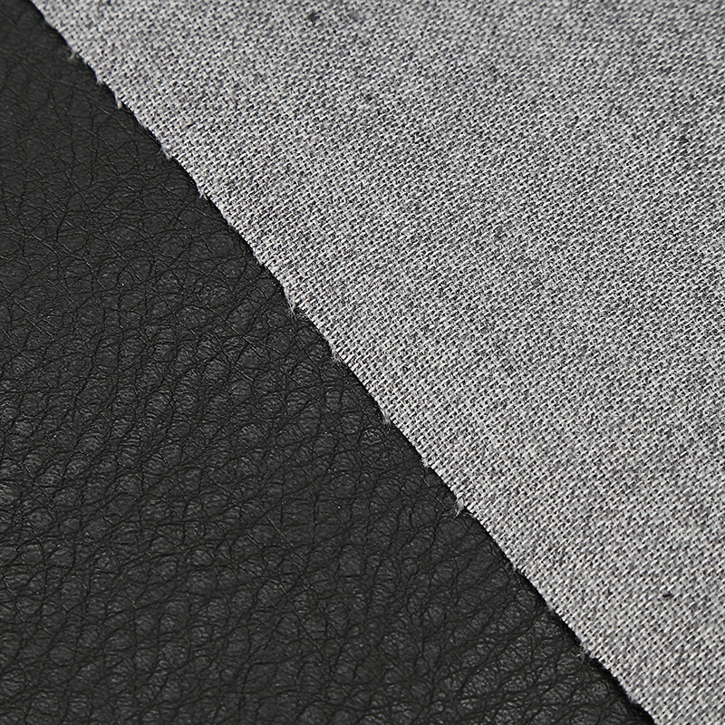 pu荔枝纹人造皮革纯黑耐磨仿真皮革 箱包家具皮带皮革面料厂家
