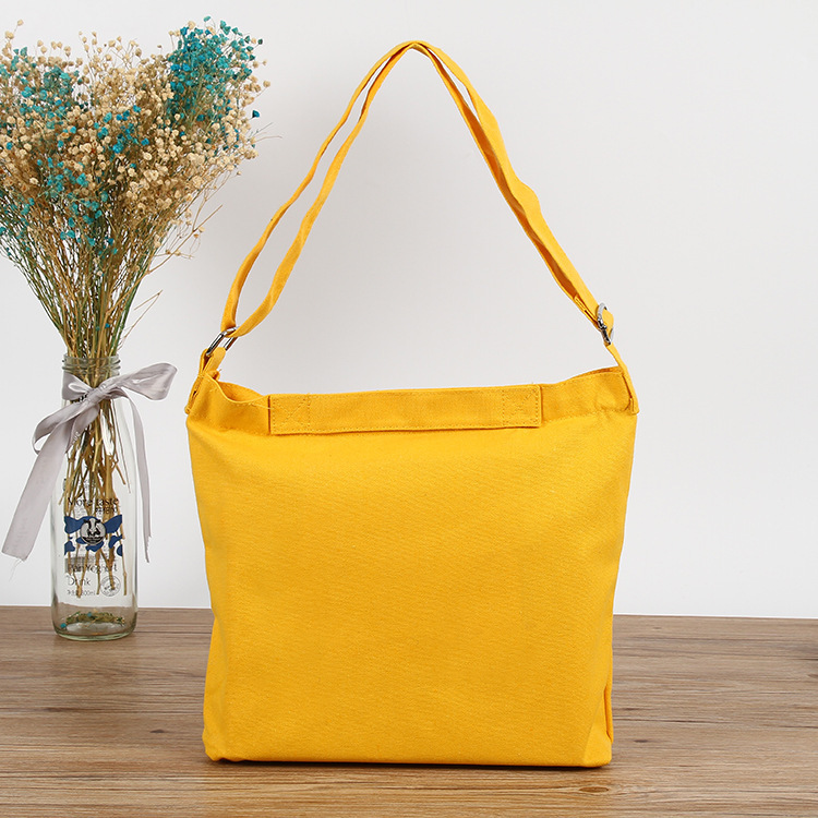 全棉黄色带扣背包帆布袋定 做带拉链可调节长度环扣背包袋定 制