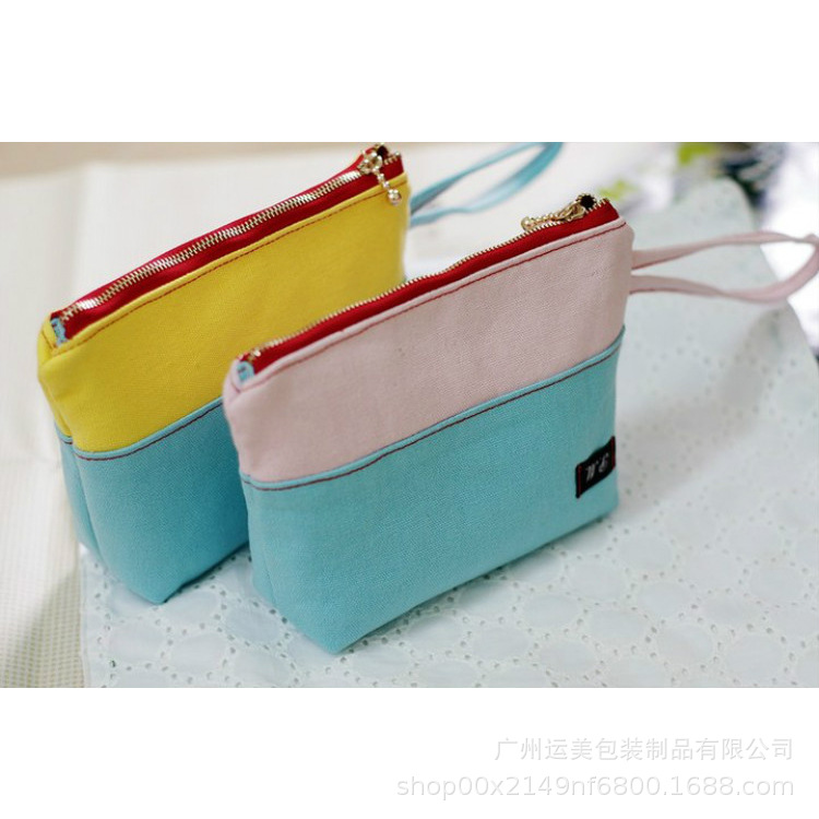 厂家定小清新手拿包大容量拼接图案精致防水拉链包自由定logo