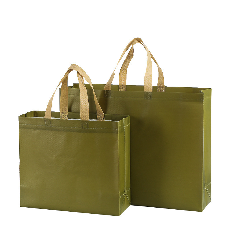 En stock película publicitaria bolso no tejido impermeable protección del medio ambiente ropa zapatos bolso de compras en blanco logotipo impreso