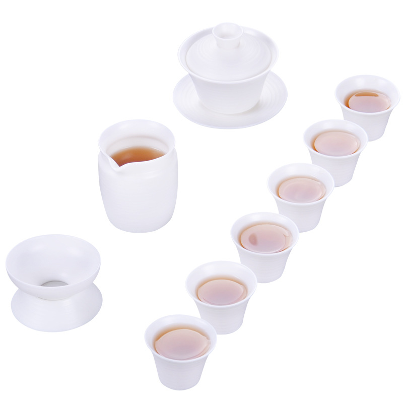 Winjiang ovejas grasa Jade porcelana Kung Fu juego de té traje de hogar Dehua porcelana blanca juego de té fabricante de té mano tirón embrión taza de té conjunto