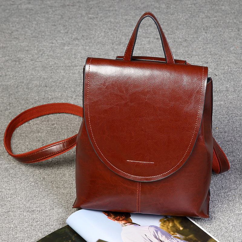 2024 nuevo cuero genuino bolso de las mujeres mochila casual mochila al aire libre bolsa de mensajero casual moda retro mochila logo