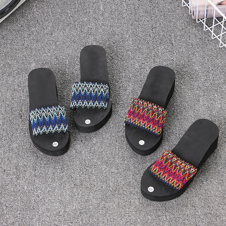 Fashionable ethnic trend slippers with a strap platform