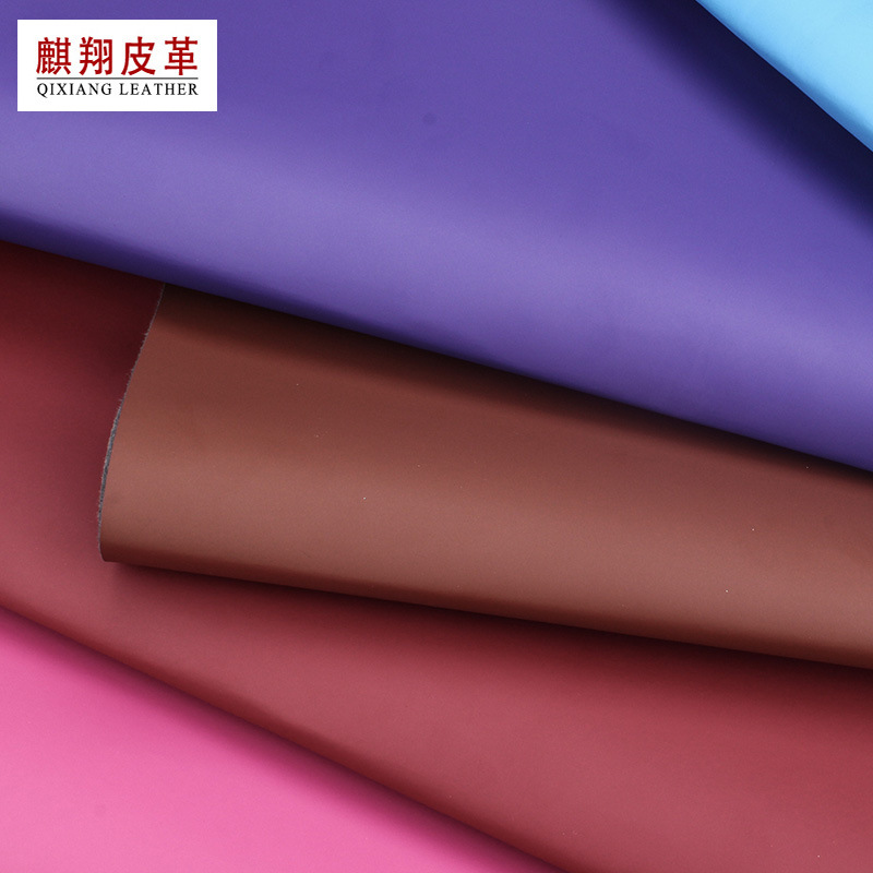 磨砂面太空革光滑平纹pu皮革鞋材面料皮带箱包皮料加厚商标合成革