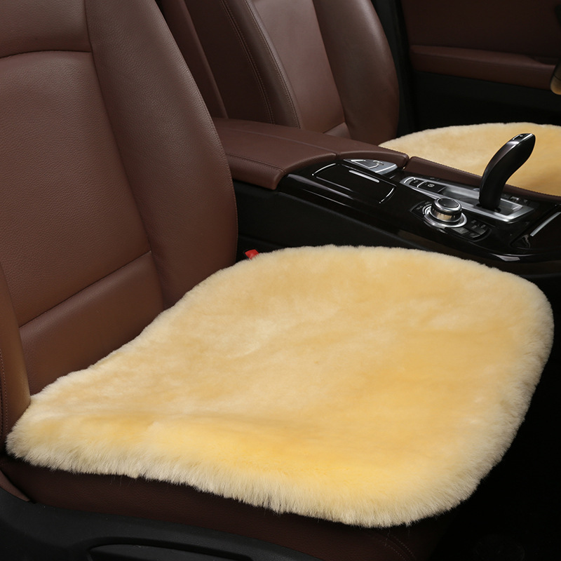 純粋なウールの自動車のクッションの冬のウールの一枚の背もたれのないぬいぐるみの前の席のクッションの厚い保温の綿毛のクッション