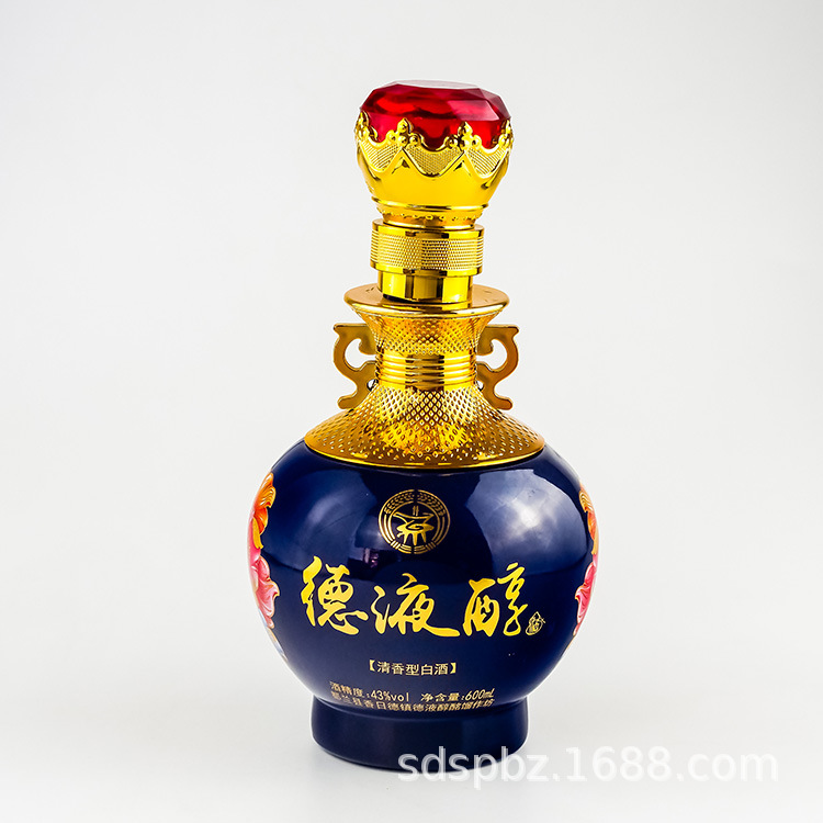 厂家生产600ml喷涂烤花牙口带套玻璃瓶 高档制作上釉彩色白酒瓶