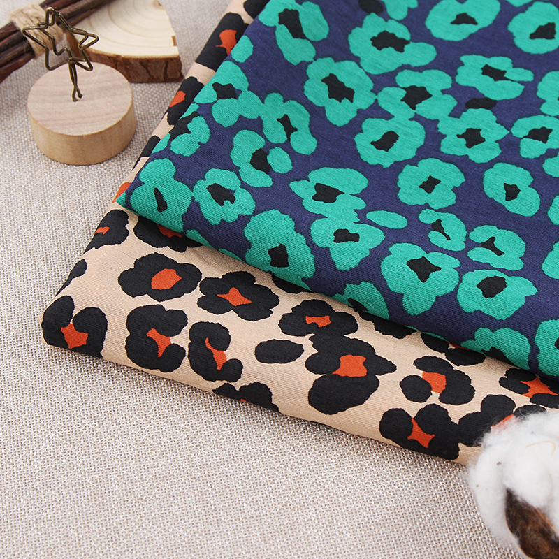 新款 梭织锦粘印染面料 春夏女装休闲短袖上衣服装面料 批发