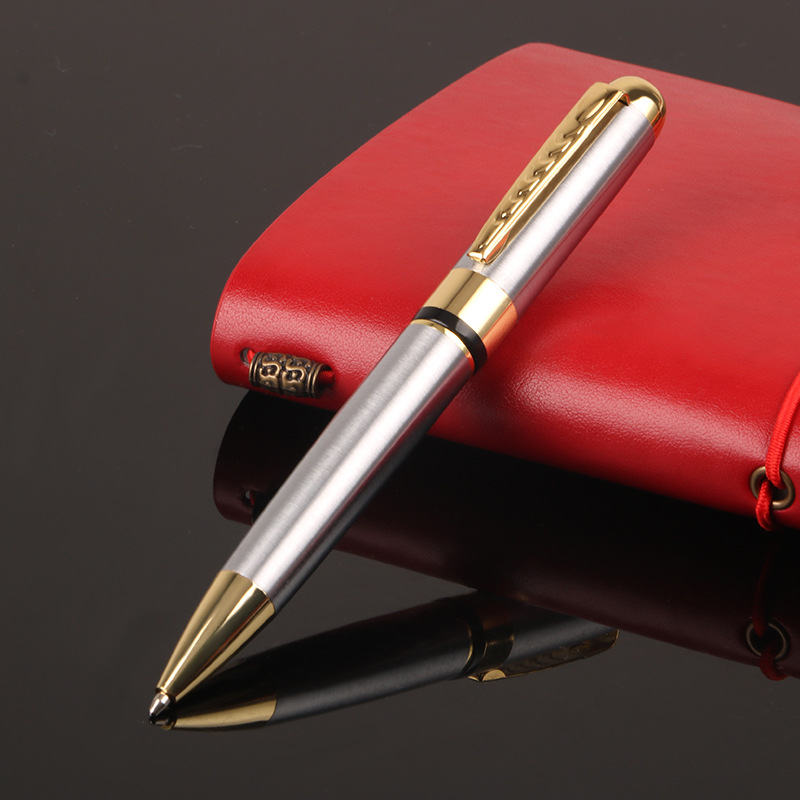 Fábrica al por mayor de metal de acero inoxidable giratorio bolígrafo publicidad creativa regalo pluma impresa LOGO entrega de una sola pieza