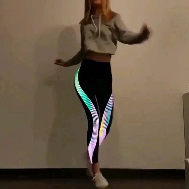 New Luminous Side Laser Strip Leggings, Fashionable European and American Slimming Sports Fitness Yoga Pants Wholesale New Luminous Side Laser Strip Leggings, Fashionable European and American Slimming Sports Fitness Yoga Pants Wholesale