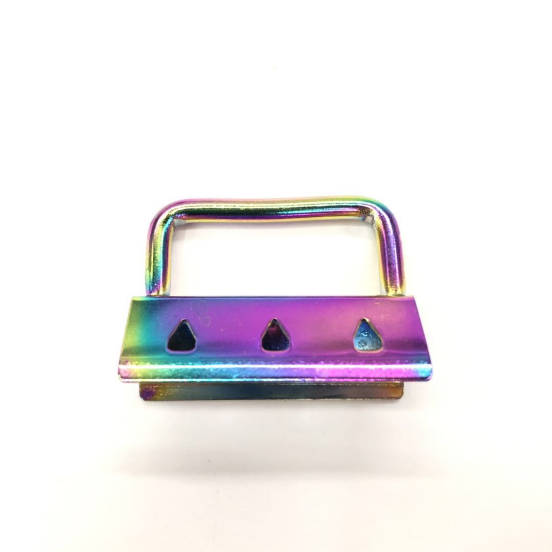 Fábrica al por mayor bolsa de siete colores clip de cola teléfono móvil cinta clip de cola fieltro bordado accesorios cola clip colgante eléctrico calidad