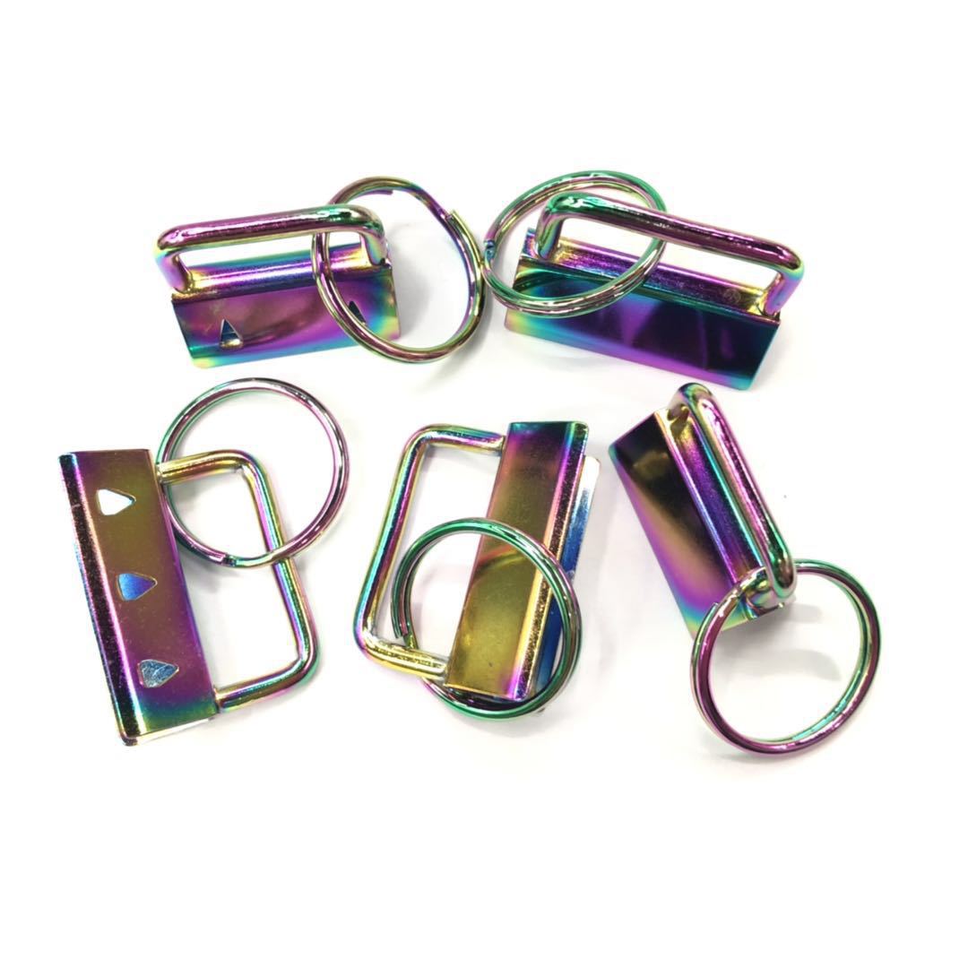 Fábrica al por mayor bolsa de siete colores clip de cola teléfono móvil cinta clip de cola fieltro bordado accesorios cola clip colgante eléctrico calidad