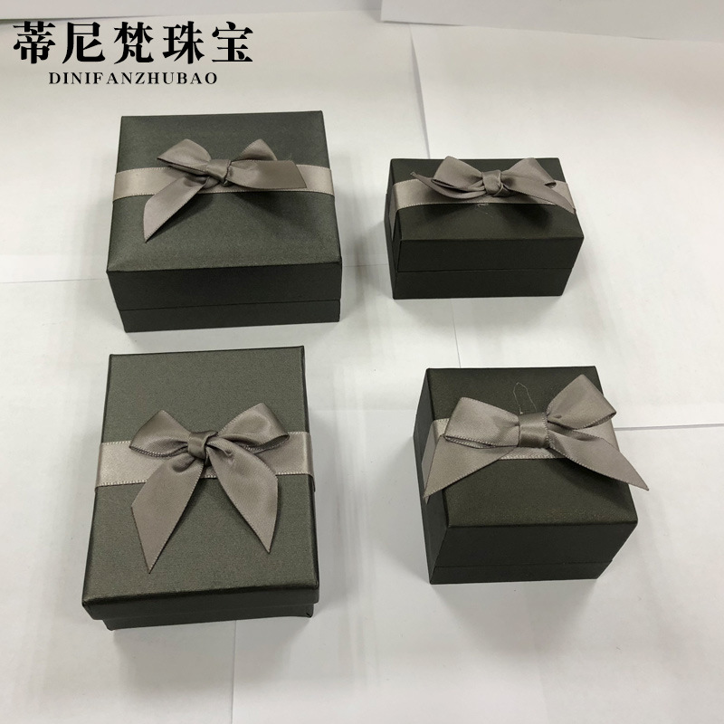 Fábrica al por mayor collar pendientes anillo caja de embalaje caja de pulsera caja de joyería arco cartón