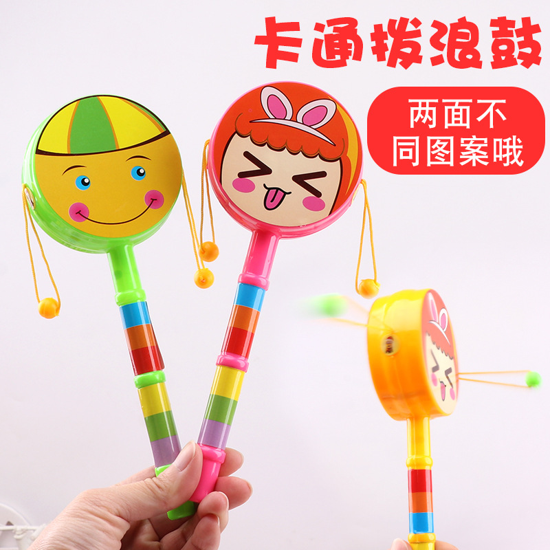 Children's smiling face rattle New Cartoon multiple patterns double-sided wave drum hand drum plastic baby toy gift