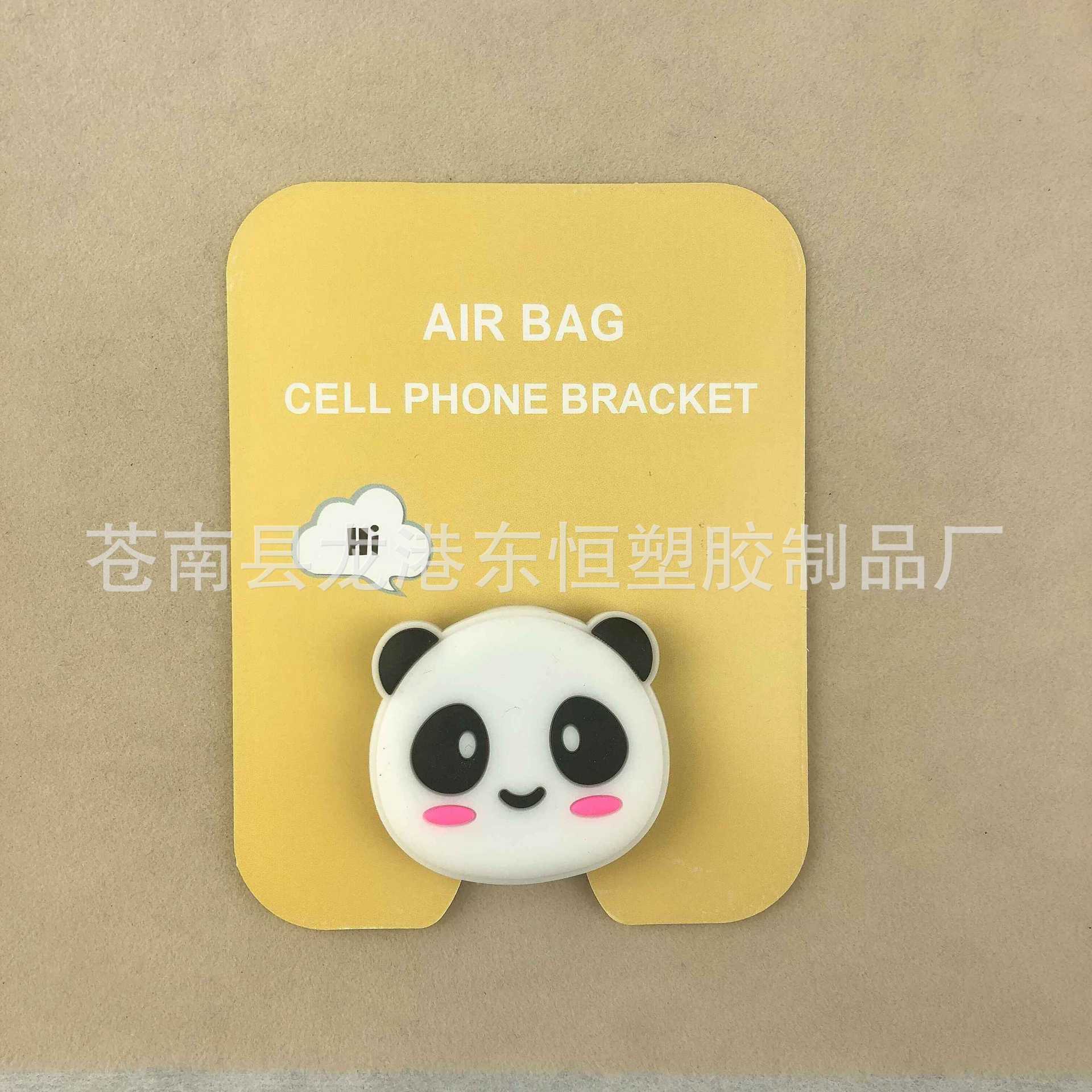 En stock al por mayor TikTok Cartoon creativo soporte de teléfono móvil puede soportar airbag soporte de teléfono móvil soporte de escritorio