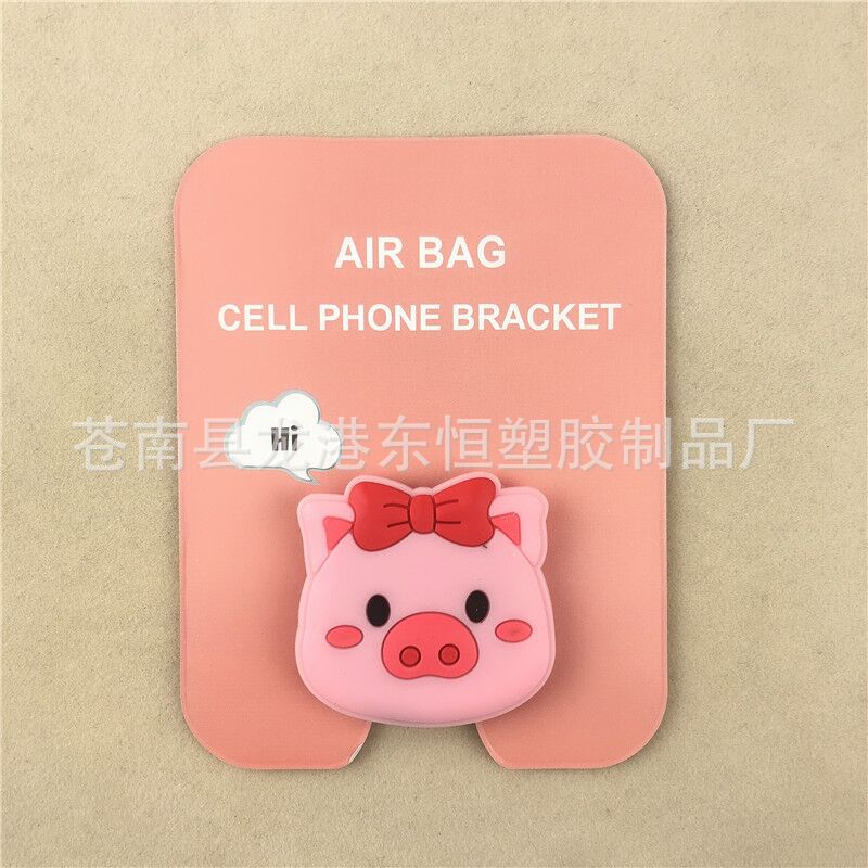 En stock al por mayor TikTok Cartoon creativo soporte de teléfono móvil puede soportar airbag soporte de teléfono móvil soporte de escritorio