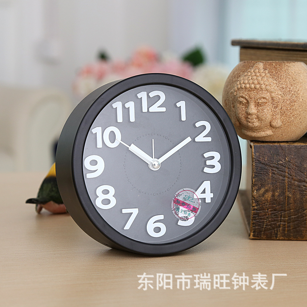 Directa de fábrica redonda tridimensional pequeño reloj de alarma estudiante reloj creativo moda simple reloj de alarma dormitorio decoración reloj