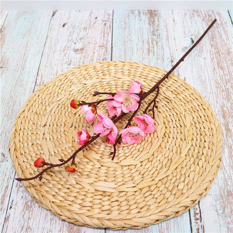 Venta al por mayor chino pastoral flor artificial del ciruelo al por mayor flor falsa pequeña flor del ciruelo rama salón flor decorativa