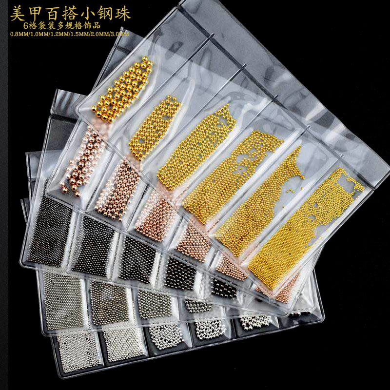Fábrica directa manicura seis rejilla tamaño bola de acero lentejuelas uñas joyería nuevo estilo japonés clavo taladro joyería Decoración