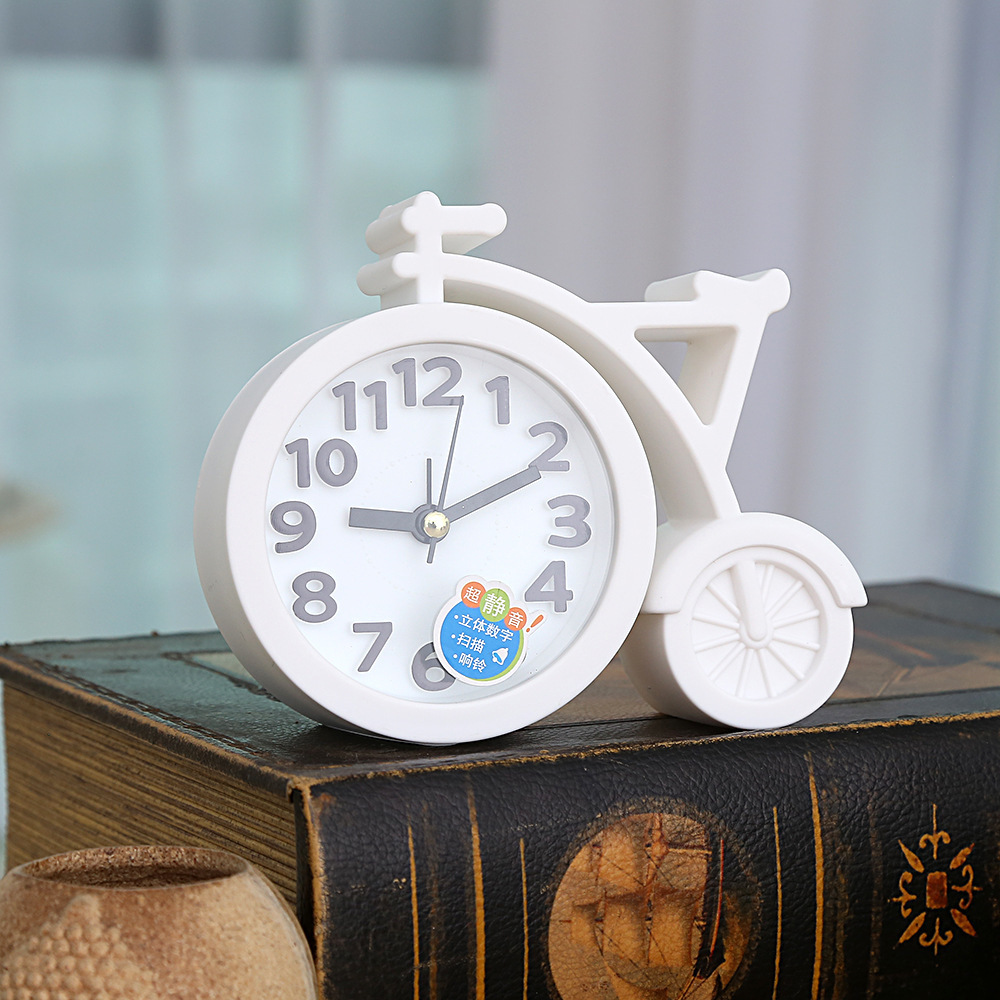 Directo de fábrica estudiante bicicleta creativa color caramelo cuarzo pequeño reloj despertador mudo caminando tiempo niños reloj al por mayor