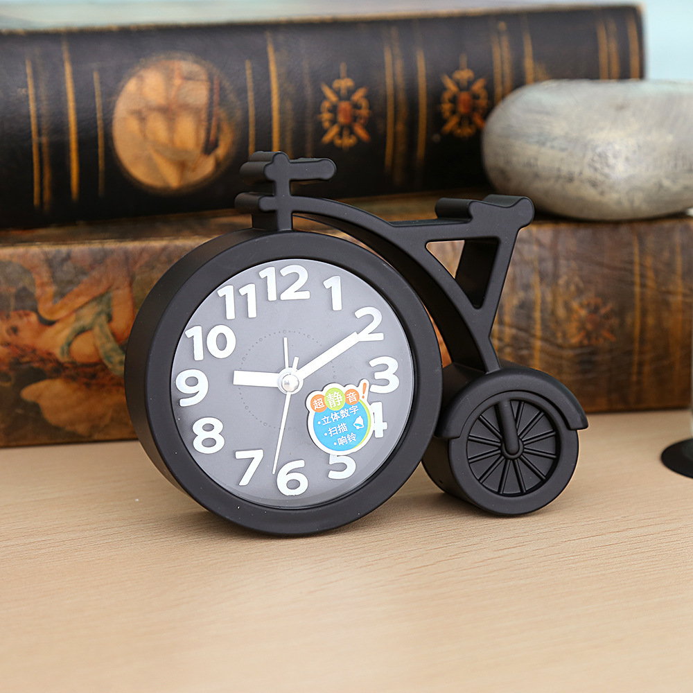 Directo de fábrica estudiante bicicleta creativa color caramelo cuarzo pequeño reloj despertador mudo caminando tiempo niños reloj al por mayor