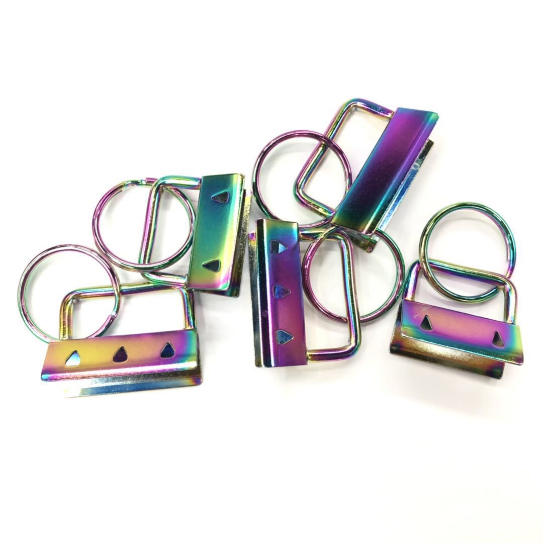 Fábrica al por mayor bolsa de siete colores clip de cola teléfono móvil cinta clip de cola fieltro bordado accesorios cola clip colgante eléctrico calidad