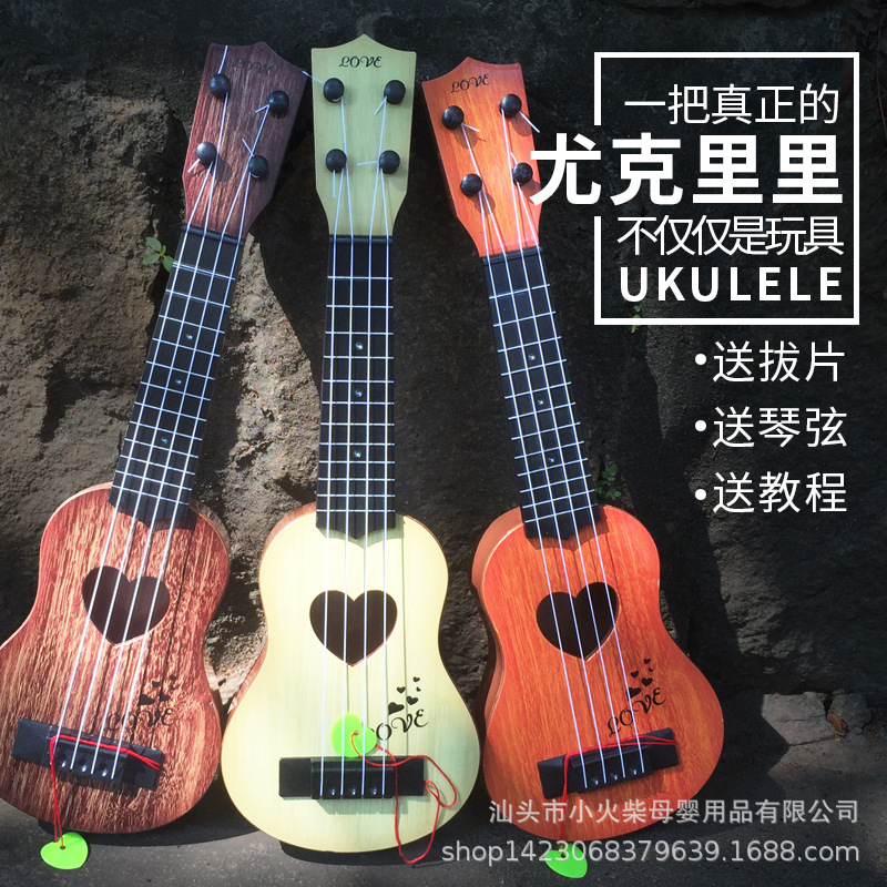 Instrumento musical de los niños simulación ukulele cuatro cuerdas puede jugar educación temprana música guitarra de juguete guitarra directa de fábrica