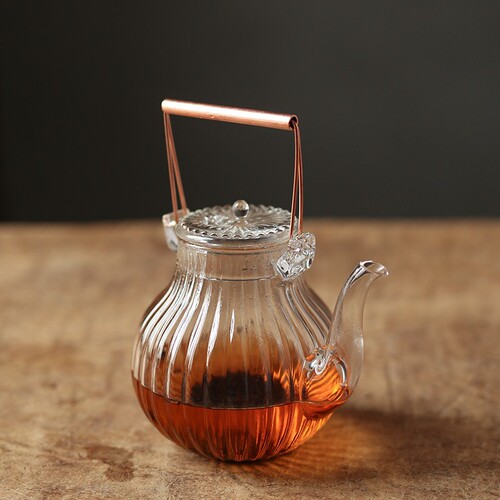 Chrysanthemum petal pattern heat-resistant glass teapot electric ceramic stove teapot teapot copper handle handle teapot flower teapot Kung Fu teapot