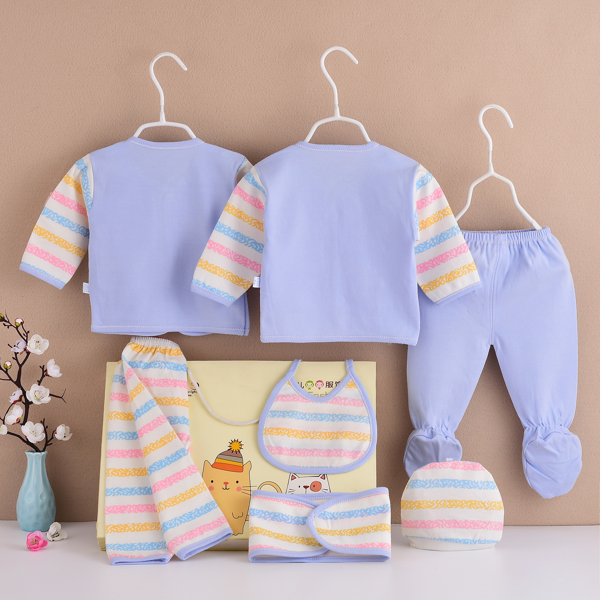 Nuevo conjunto de siete piezas de algodón para bebés y niños pequeños, niños y niñas, directamente del fabricante, paquete de regalo de ropa y artículos para recién nacidos en una bolsa.