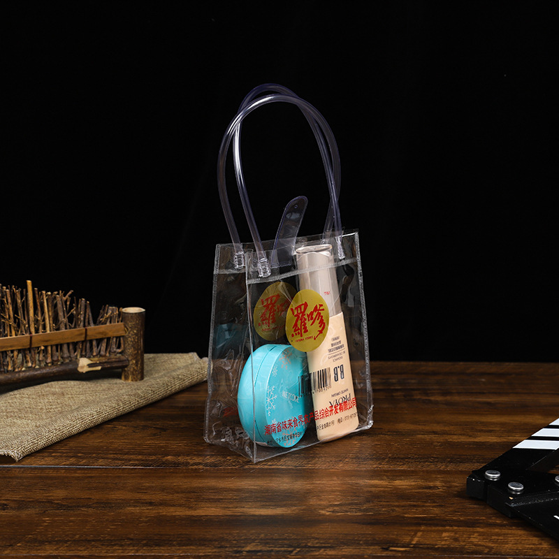 厂家批发PVC透明手提袋化妆品洗发水包装袋塑料广告购物袋礼品袋