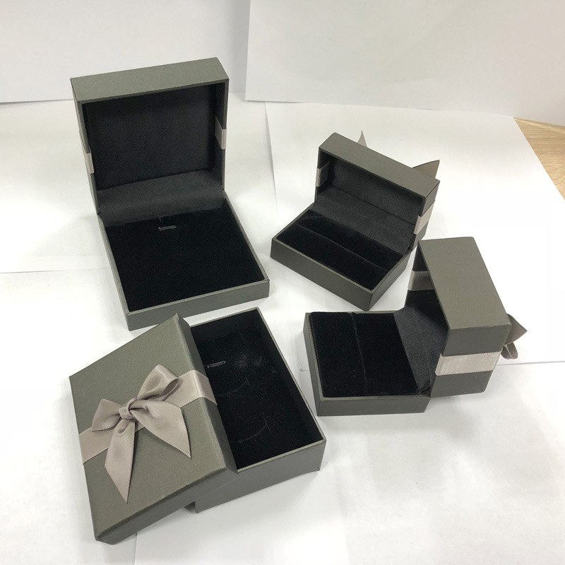 Fábrica al por mayor collar pendientes anillo caja de embalaje caja de pulsera caja de joyería arco cartón