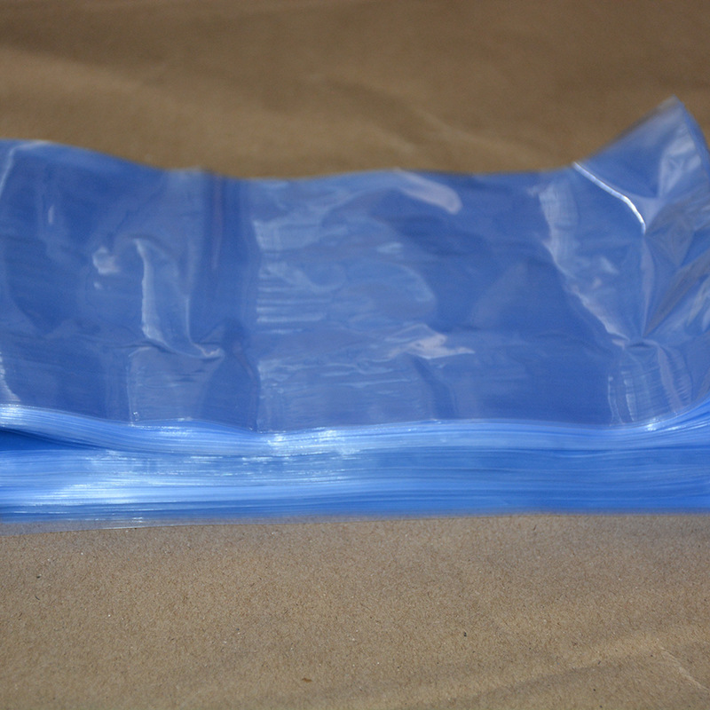 供应PVC热收缩膜 热收缩袋 平口袋 弧形袋 任意规格颜色膜可选