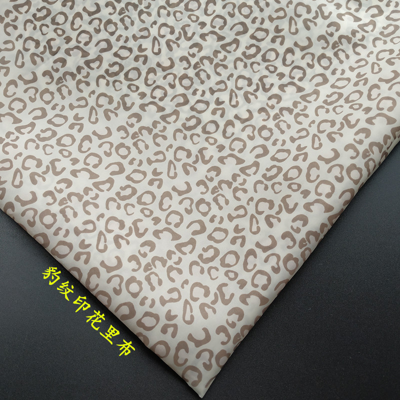 米黄豹纹里布210T平纹涤塔夫热转移纸印花秋冬服装箱包饰品内里衬