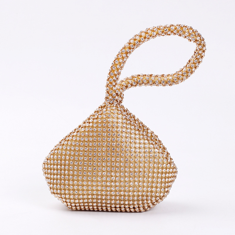 Bolso de noche de estilo europeo y americano de las mujeres incrustadas en diamantes Bolso transfronterizo de diamantes de imitación de moda bolso cosmético portátil mina bolsa