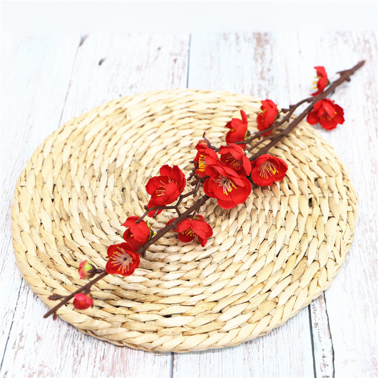 Venta al por mayor chino pastoral flor artificial del ciruelo al por mayor flor falsa pequeña flor del ciruelo rama salón flor decorativa