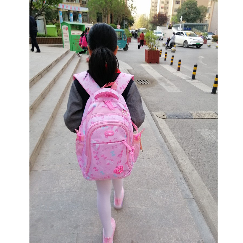 Mochila de estudiantes de primaria de Amazon para niñas de grado 3-6 para reducir la carga, mochila escolar para niños ultraligera, mochila para campus de dibujos animados