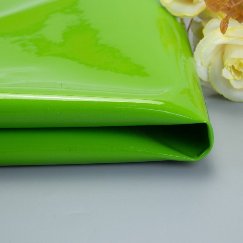 0.8mm水晶镜面光胶针织底PVC皮革 亮面漆皮人造箱包革家具包装革