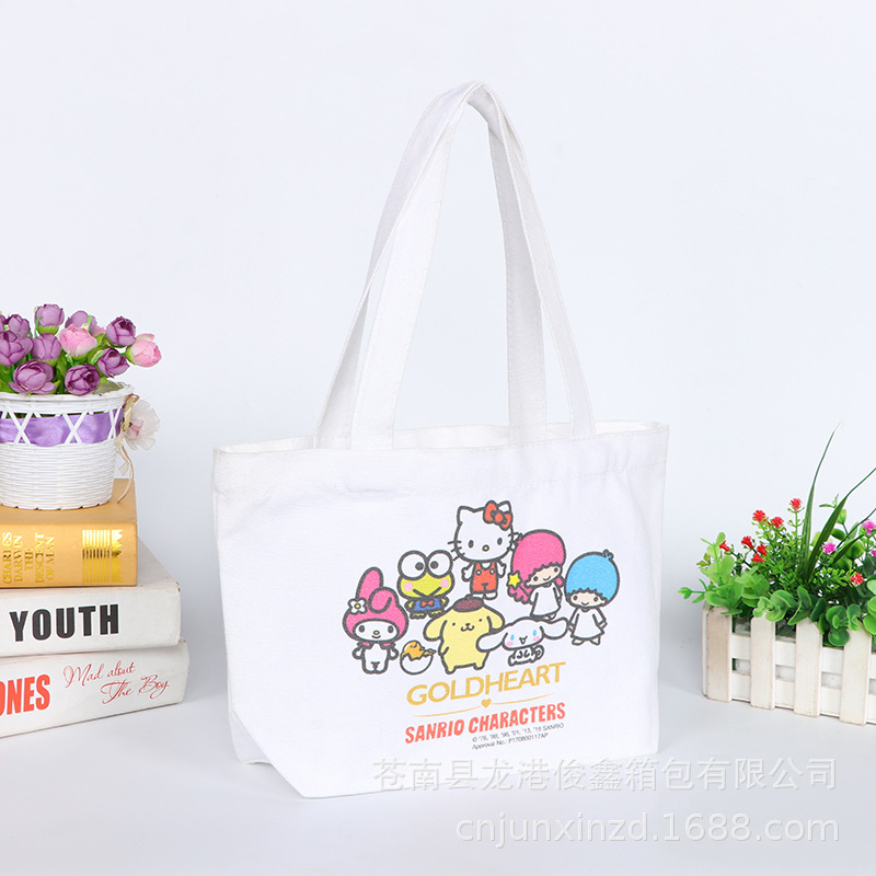 Fabricante de bolsas de lona estampadas con dibujos animados, venta al por mayor de bolsos de hombro literarios para mujer, bolso de algodón simple para estudiantes, bolsa de almacenamiento portátil.