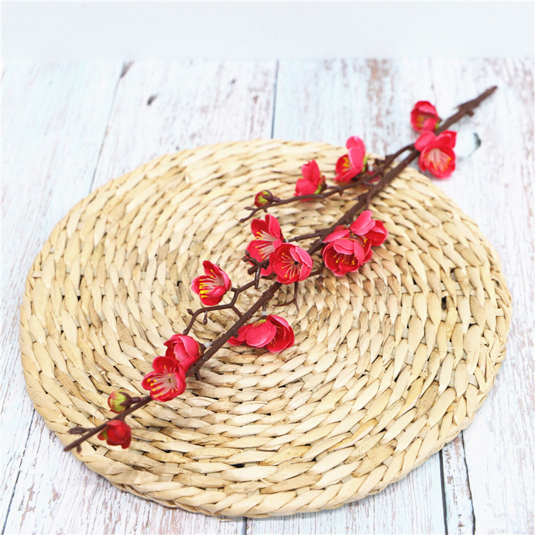 Venta al por mayor chino pastoral flor artificial del ciruelo al por mayor flor falsa pequeña flor del ciruelo rama salón flor decorativa