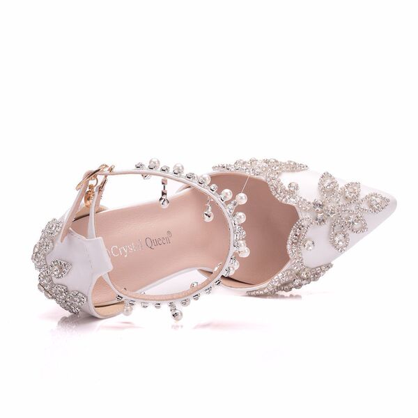 White wedding shoes pointed-toe with extremely high heels for bride