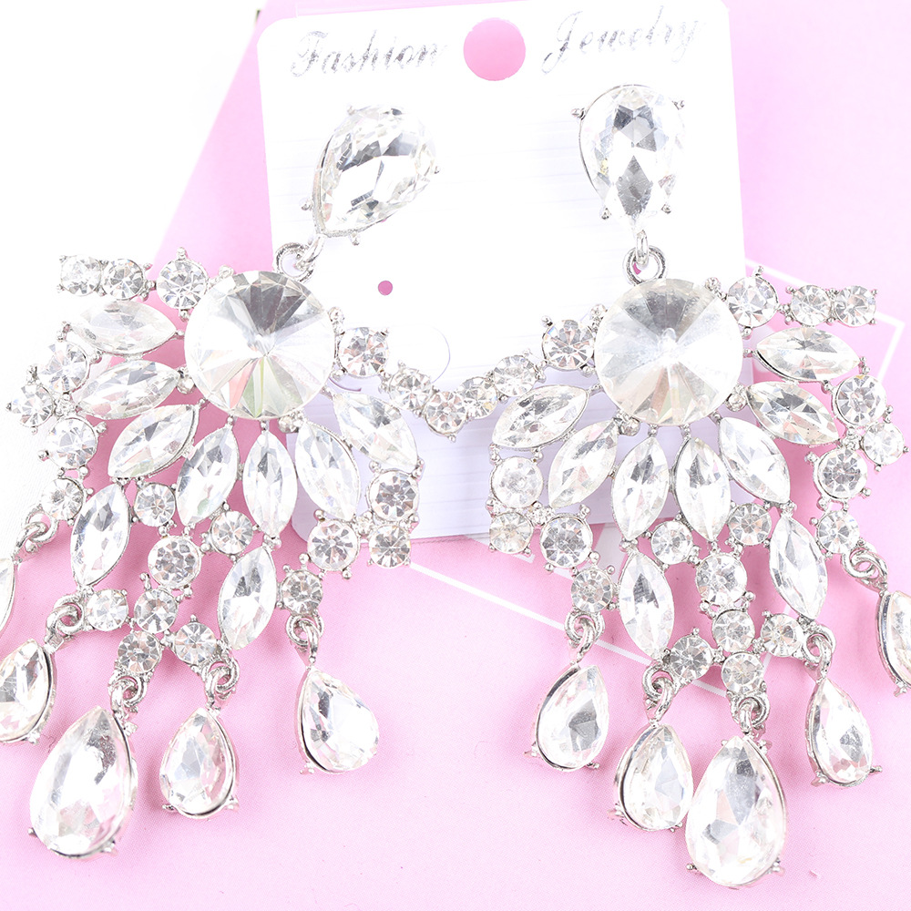 Fashionable earrings drop-shaped