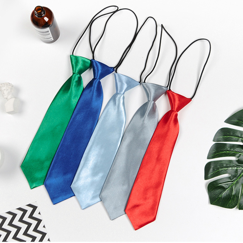 Hombres y niñas estudiantes de color sólido corbata pequeña al por mayor rendimiento del equipo de escenario negro tibetano azul spot fábrica directa