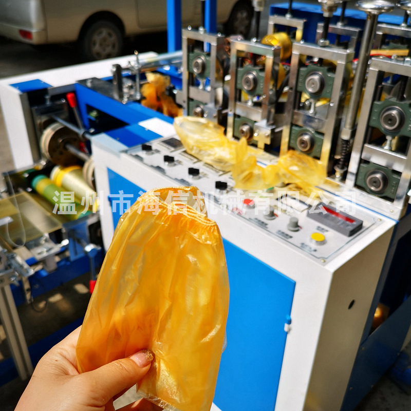 厂家供应PE鞋套工厂一次性脚套机 CPE圆橡皮筋塑料鞋套制造机