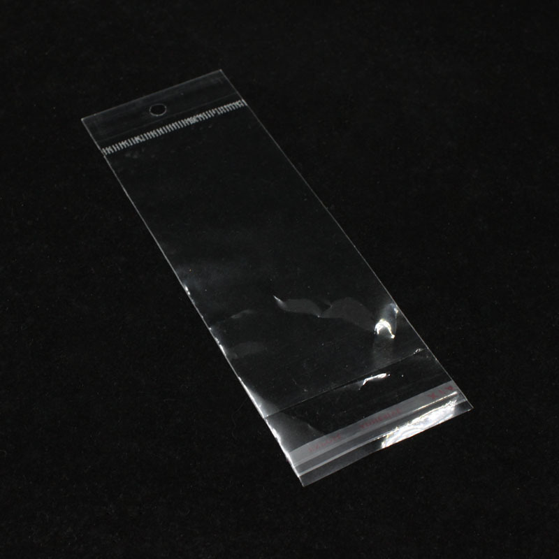 厂家直销  包装饰品透明opp自封袋子6cm*18cm 内空6*12cm带挂带胶