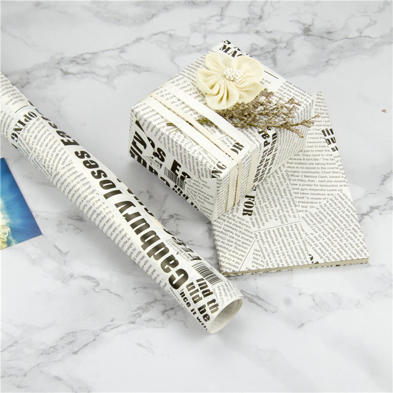 Papel Kraft periódico patrón retro europeo regalo papel de embalaje papel hecho a mano papel de embalaje cubierta de libro de papel