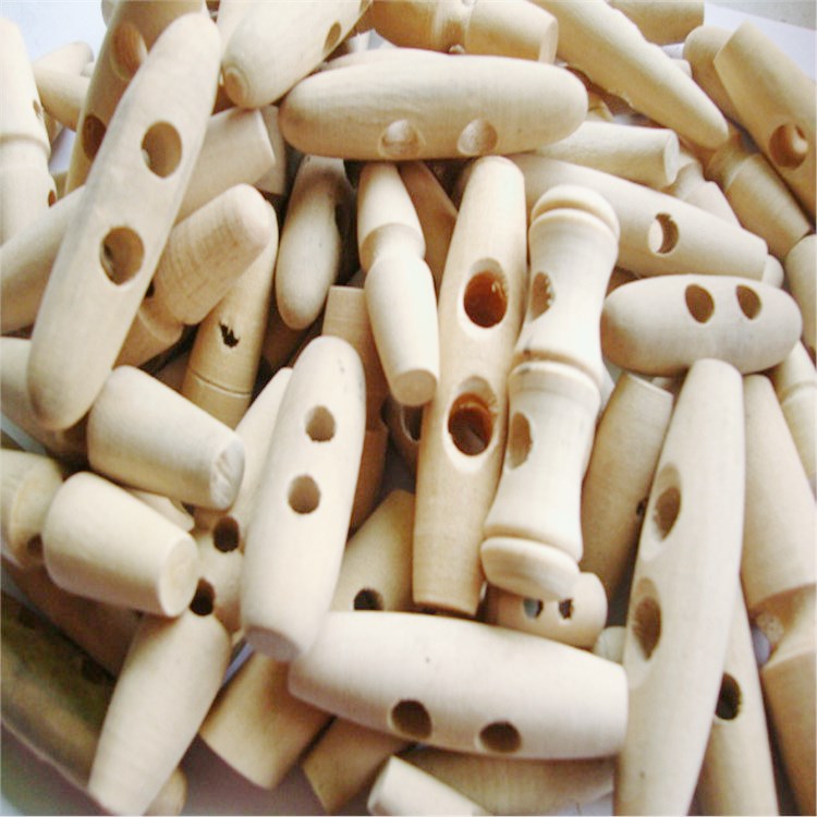 东莞星光厂家直销橄榄木纽扣圆棒形彩色环保激光木头小钮扣子批发