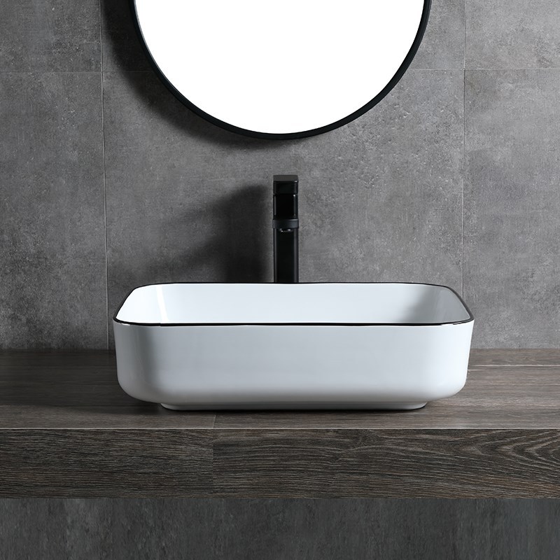 Borde negro lavabo de mesa de cerámica personalizado simple hotel nuevo lavabo de arte de cerámica lavabo lateral ultrafino lavabo de mesa al por mayor